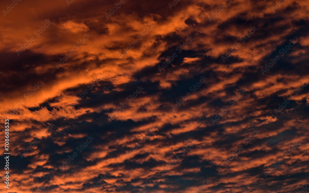 dramatic Red clouds for pattern background. A burning sky in a horror movie. crimson storm in apocalyptic, judgment day.