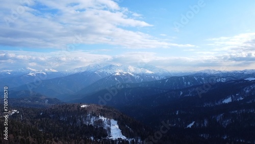 Elbrus region  huge  rocky mountain peaks covered with grass and snow  Kabardino-Balkaria