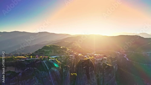 Golden rays of sun magestic nature landscape. Meteora monastery in Greece photo