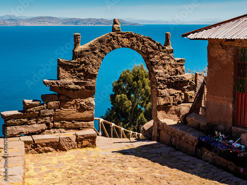 Amazing landscape on island Taquile with typical stone arch, Lake Titicaca, Puno region, Peru
 photo