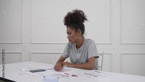 Stressed young woman has financial problems with credit card debt to pay crucial show concept of bad personal money and mortgage pay management crisis. photo