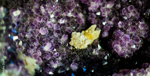 Purple amethyst with citrine stones. Mineral exchange. 