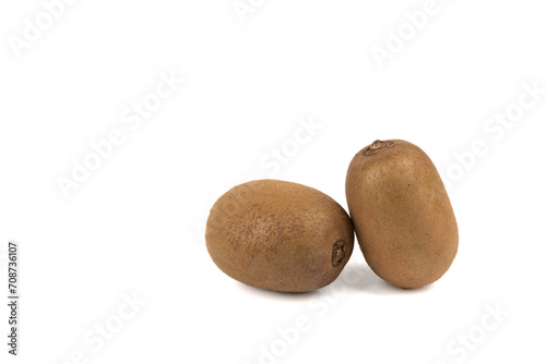 Two ripe kiwis on a white background with space for text.