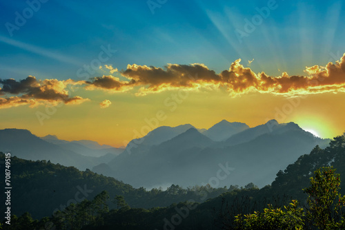 View of beautiful mountain landscape at sunset at Monson viewpoint Doi AngKhang, Chaingmai Thailand. photo