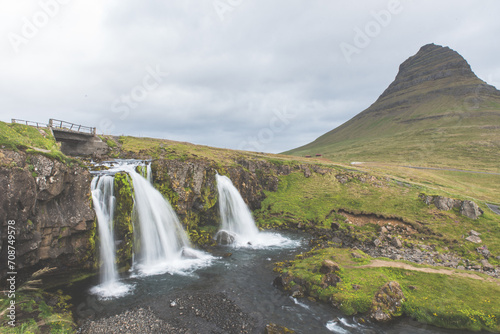 Moody Waterfall Under Mountain