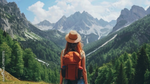 Young woman traveler taking a beautiful landscape at the mountains, Travel lifestyle concept