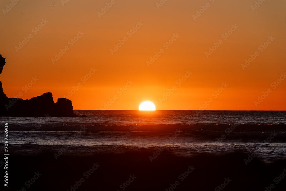 Sunset at Piha, West Auckland, Auckland region of New Zealand. January 12, 2024 - 8