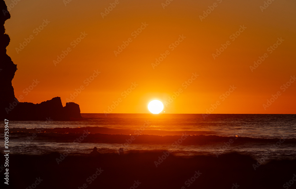 Sunset at Piha, West Auckland, Auckland region of New Zealand. January 12, 2024 - 12