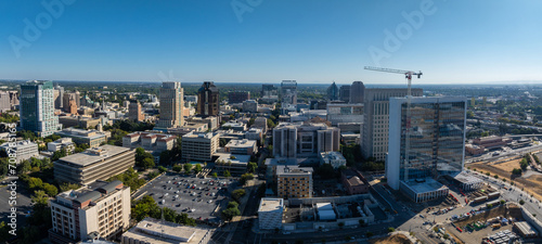 The Tower Bridge in Sacramento, California with the city of of Sacramento in the background and blue sky