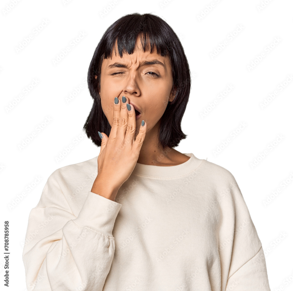 Young Hispanic woman with short black hair in studio yawning showing a tired gesture covering mouth with hand. Young Hispanic woman with short black hair in studio yawning showing a tired gesture covering mouth with hand.
