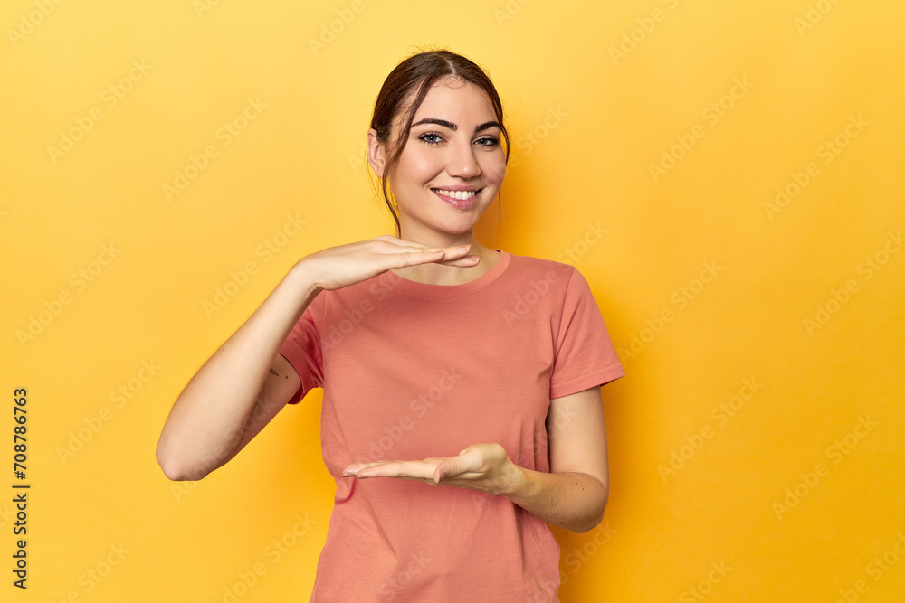 Obraz premium holding something with both hands, product presentation.