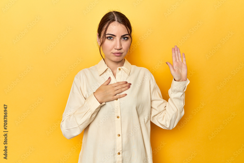 taking an oath, putting hand on chest. taking an oath, putting hand on chest.
