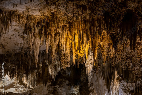 Golden Lights Brighten Up Stalactites Hanging From Carlsbad Caverns