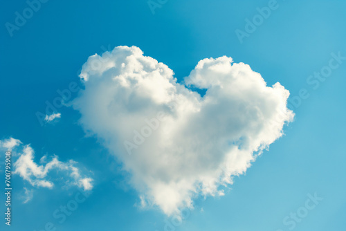 white cloud in heart shape on blue sky for love or valentine's day concept