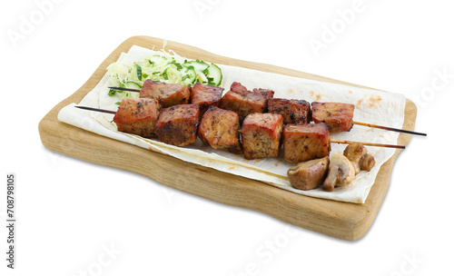 Board with delicious shish kebabs, vegetables and lavash isolated on white