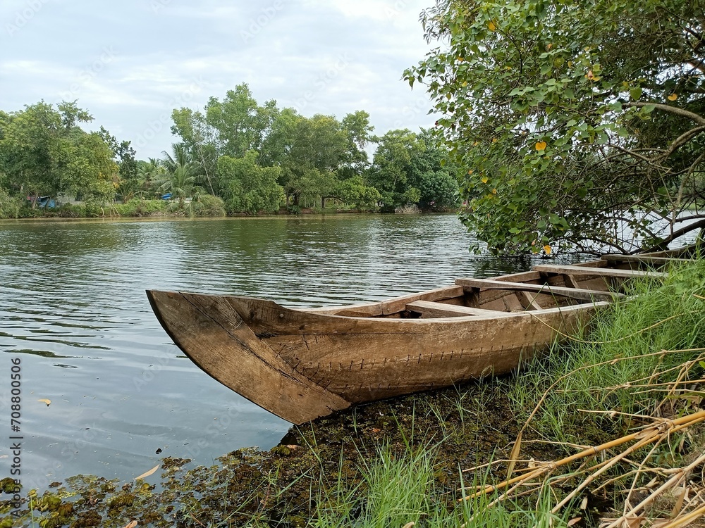 A wooden vehicle used for water transport is usually called a canoe.