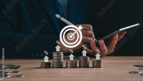 Interest rate increase concept. Businessman show  percentage and up arrow investment, Interest rate increase, business hike growth, stocks, mutual fund, high exchange rate. Long term investment photo