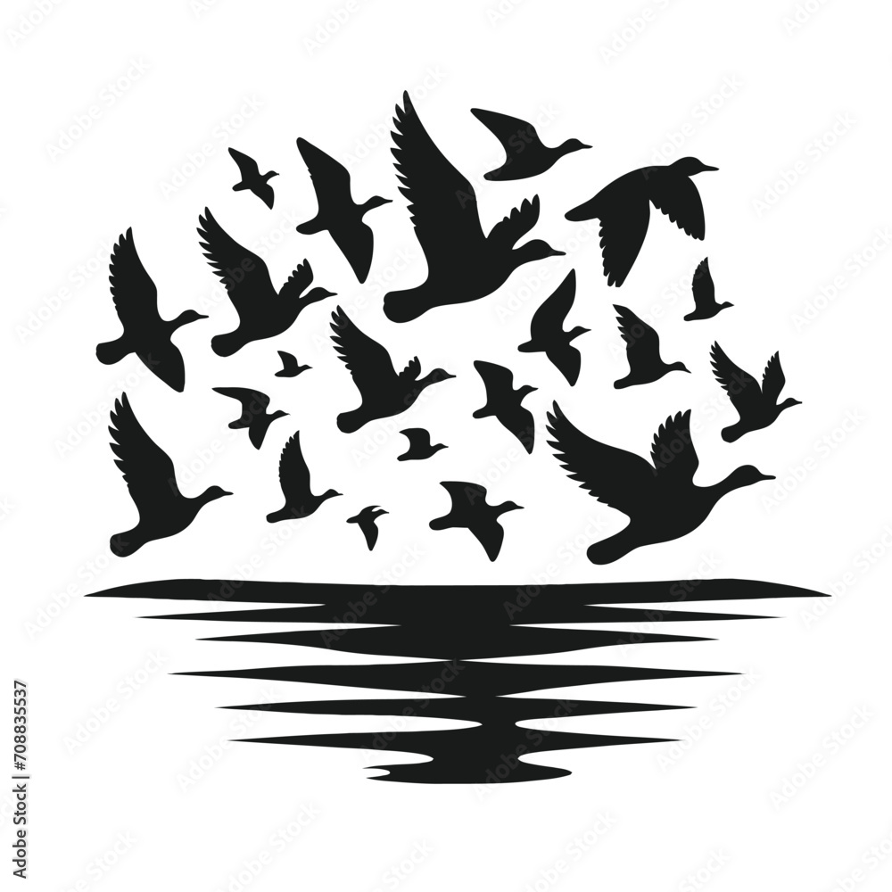 Obraz premium Flock of Birds in Flight over Water Silhouette