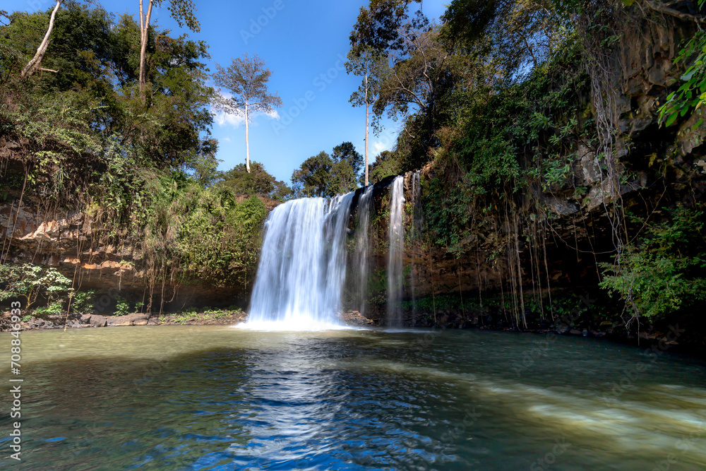 Obraz premium Beautiful Katieing Waterfall amidst tropical nature in the middle of Asian jungle. This waterfall is in Krong Ban Lung town, Cambodia