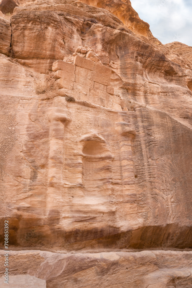 Pagan Nabatean altar carved into wall of the gorge Al Siq in the Nabatean kingdom of Petra in Wadi Musa city in Jordan
