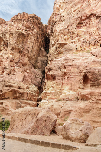 The beauty  of high mountains at beginning of the gorge Al Siq in Nabatean kingdom of Petra in Wadi Musa city in Jordan