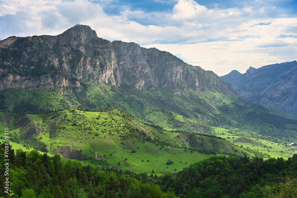 Obraz premium Morning sun illuminates the mountain valley of Egikal, Ingushetia Republic of Russia