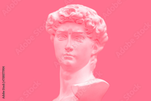  pink antique statue of david's head marbel Concept of modern art and cyberpunk with pink background