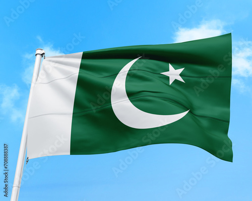 Pakistan flag fluttering in the wind on sky.