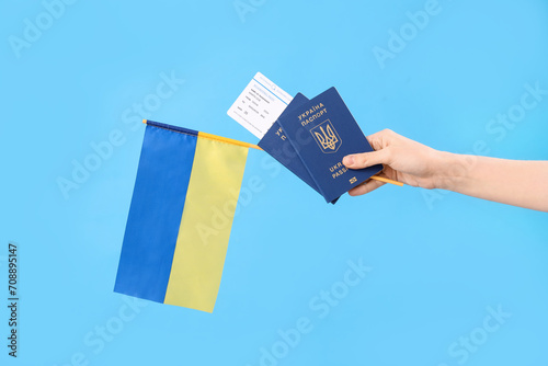 Woman with passports, ticke...