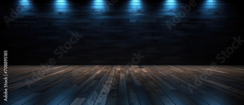 wood floor with dark black wall with blue lighting