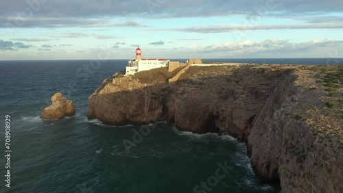 Aerial video of the lighthouse and cliffs at Cape St. Vincent. The sea view of the Algarve