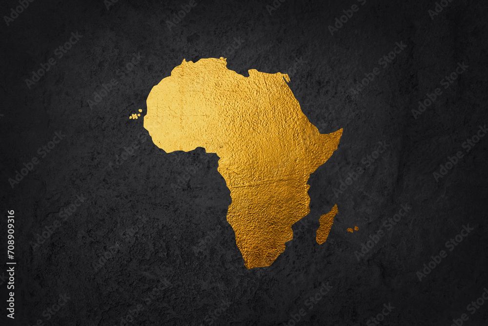 Africa continent shaped from golden glitter on a black background.