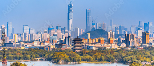 Scenery of Daming Lake in Jinan  Shandong  China and the CBD in the distant new area