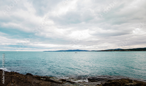Landscape with sea and cloudy dramatic sky