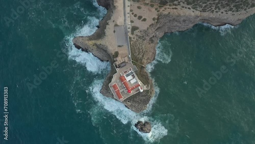 Aerial video of the lighthouse and cliffs at Cape St. Vincent. The sea view of the Algarve