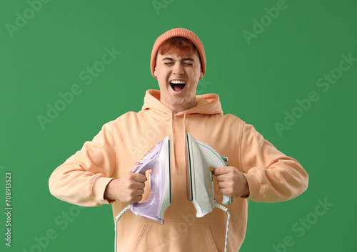 Cheerful young man with ele...
