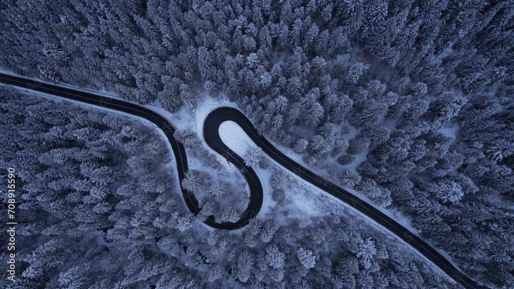 Top view of spectacular mountain road in winter.Serpentines from Romania mountains,Cheile Bicazului.