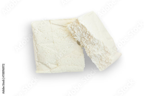 Briquette of fresh cottage cheese isolated on a transparent background. View from above.