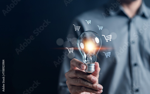 Businessman hold lightbulb, Owner business commerce online startup profit earning and goal successful franchise store. Future best product and store and competent system