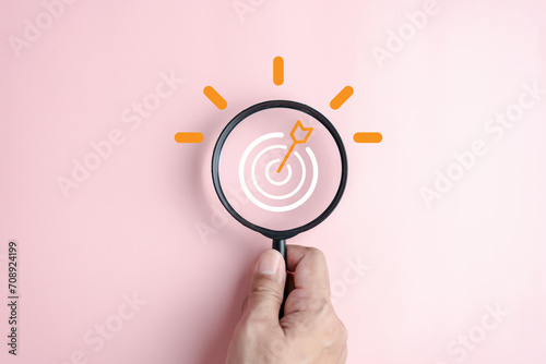 Magnifier glass focus to target objective with idea creative light bulb icon. planning development leadership and customer target group concept.