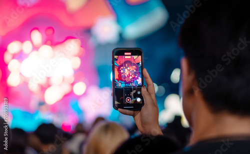 people holding smart phone and photographing in music festival concert, party event background concept 