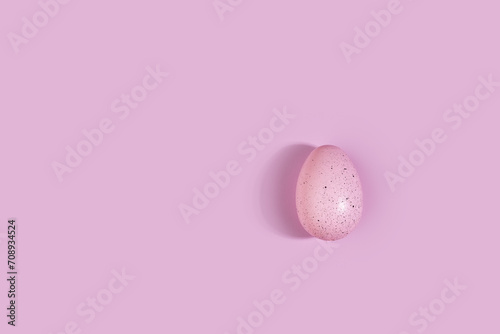 Easter egg on a pink background