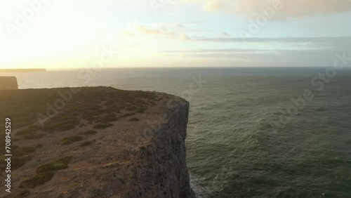 Aerial video of the lighthouse and cliffs at Cape St. Vincent. The sea view of the Algarve