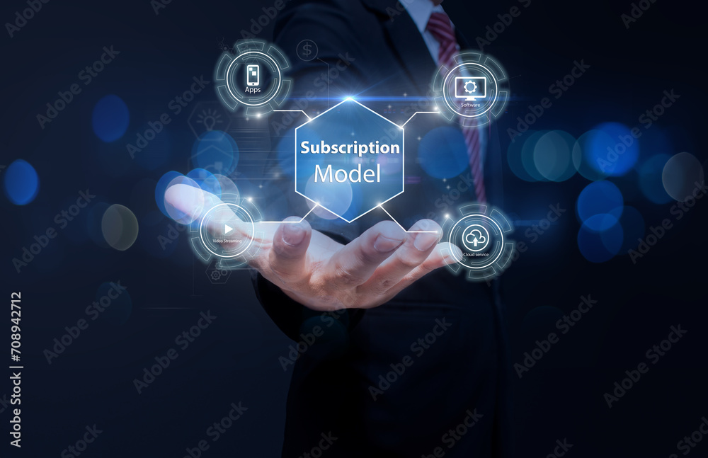Subscription business model concepts.Business man hands holding subscription holographic Subscription business model concepts.Business man hands holding subscription holographic