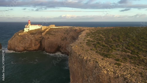 Aerial video of the lighthouse and cliffs at Cape St. Vincent. The sea view of the Algarve