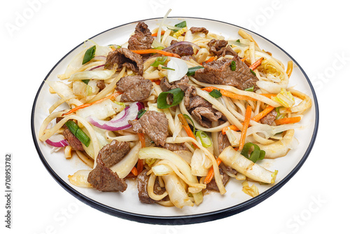 Vietnamese cuisine and food, udon noodles with vegetables and beef on a plate, on a white isolated background