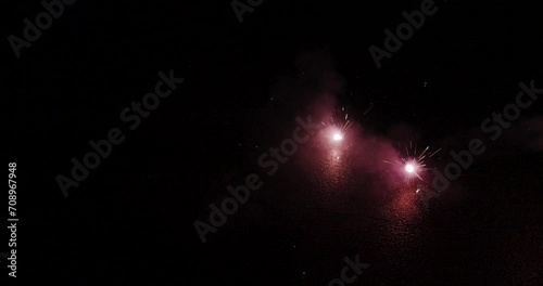 Feuerwerk am Boden an Silvester mit tollen schönen Effekten, Funken und Farben photo