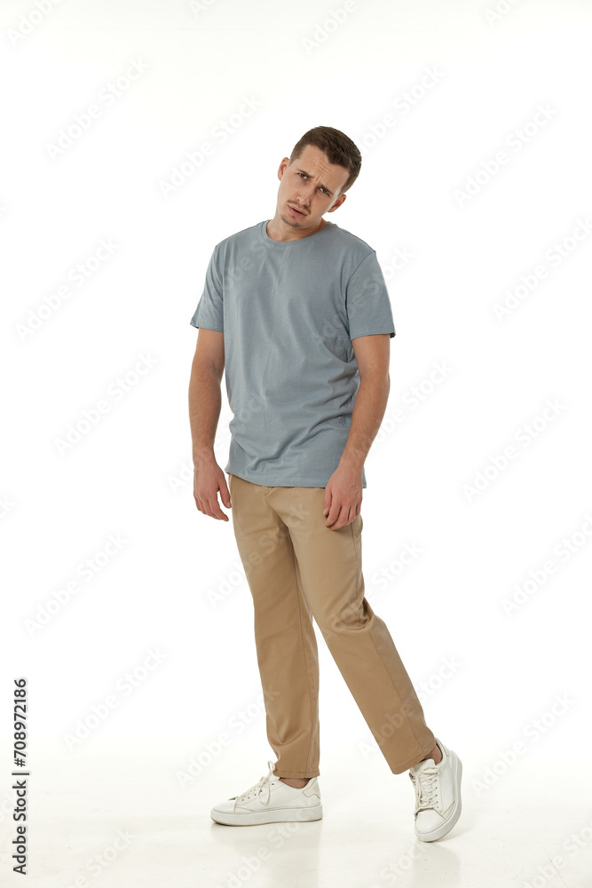 offended frustrated young man on white background. sadness offended frustrated young man on white background. sadness