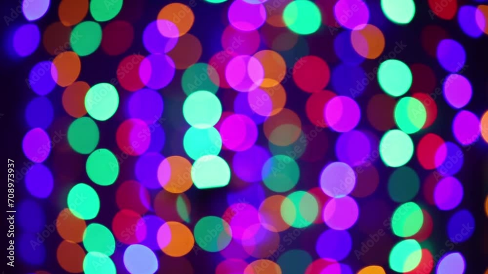 Bokeh of many colored lights at show in night club Bokeh of many colored lights at show in night club