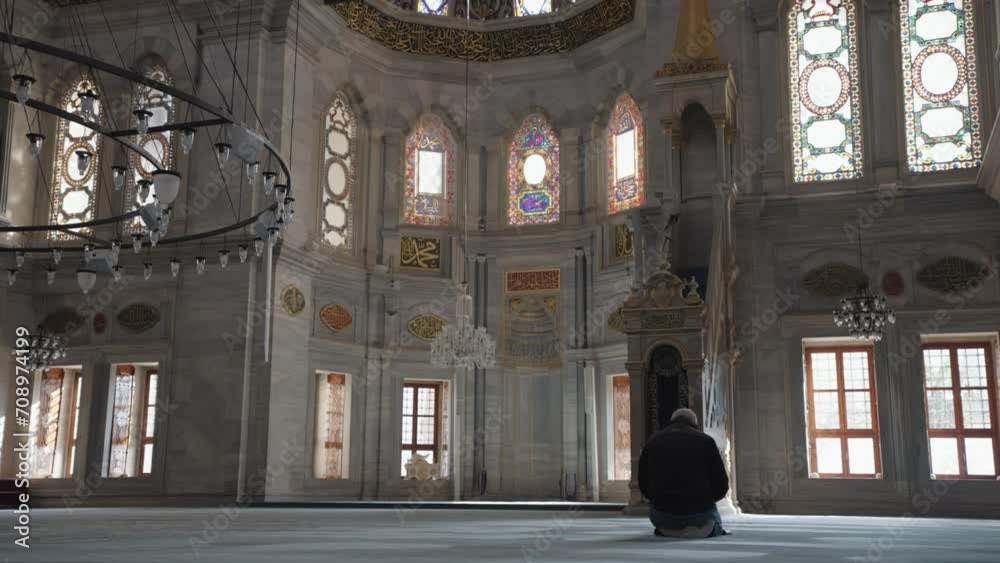 Muslim Man Salah salat Pray inside Nuruosmaniye Camii Mosque Architecturally significant Ottoman mosque Istanbul, Turkey
